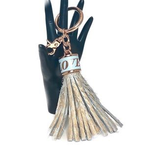Mel Boteri Leather Tassel Love Charm